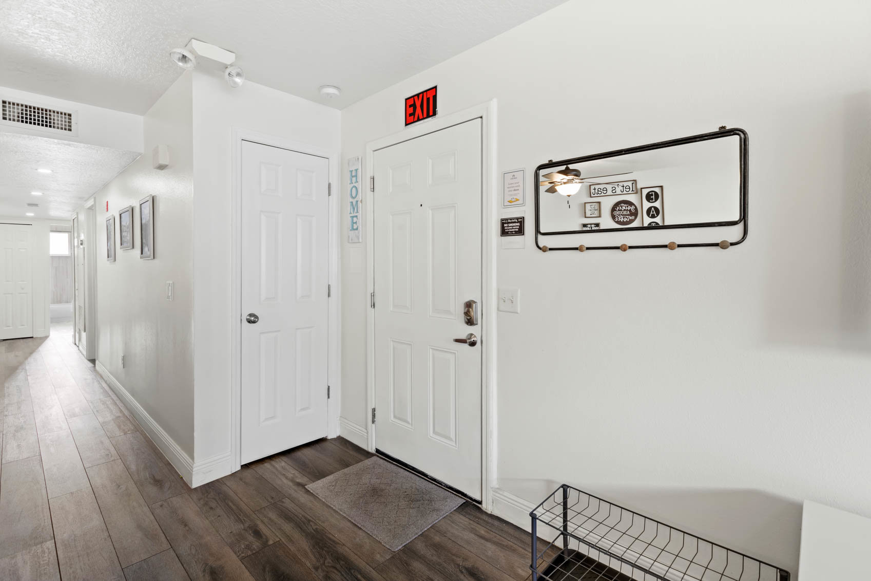 inside front door with white hallway
